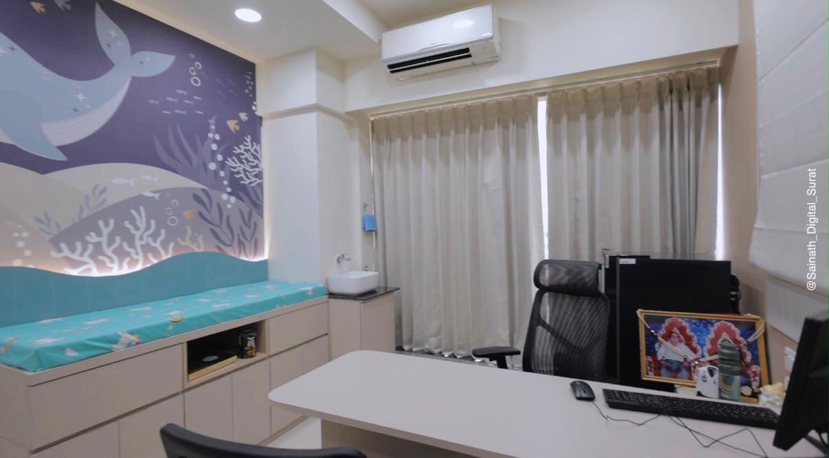 Pediatric consultation room with underwater mural