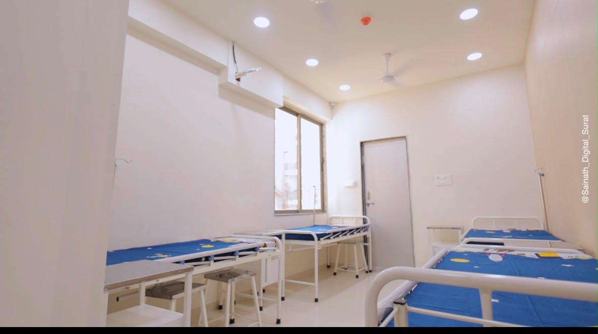 Clean in-patient ward with child-friendly bedding